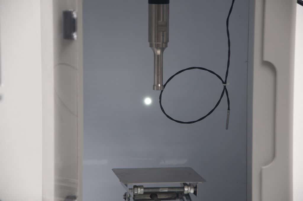 Ultrasonic homogenizer processing chamber